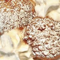 Deep Fried Oreos · 2 pieces. Fried Oreos topped with powdered sugar and whip cream.