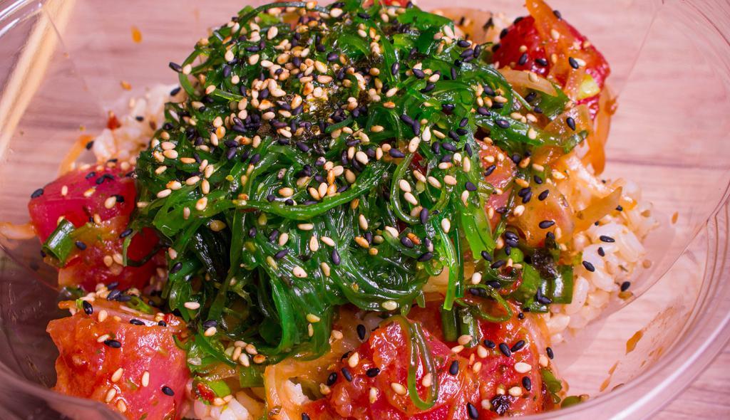 Classic Shoyu · TUNA/SALMON with onions, scallions, marinated in Citrus Ponzu topped with seaweed salad & furikake.