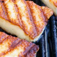Halloumi Cheese - Appetizer · Greek Cypriot goat cheese, grilled and sprinkled with imported oregano.