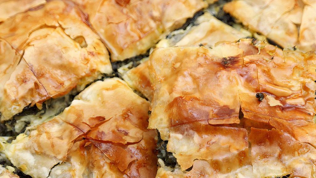 Spanakopita Spinach Pie · Savory spinach and feta in a crispy phyllo dough.