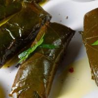 Grape Leaves · Stuffed grape leaves with rice, herbs & extra virgin olive oil.