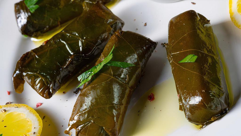 Grape Leaves · Stuffed grape leaves with rice, herbs & extra virgin olive oil.