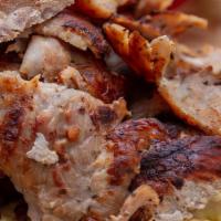 Pork Gyro - Plate · Layered pork gyro meat, cooked with fresh herbs & spices. Served with choice of 2 sides, pit...