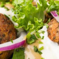 Falafel - Sandwich · Ground chickpea cooked with fresh herbs & spices. Served in pita bread with lettuce, tomatoe...