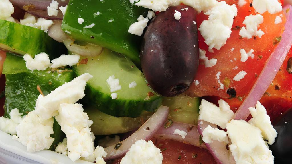 Horiatiki (Authentic Greek Salad) · Authentic Greek salad - traditional Greek villager's salad with Arahova feta, plum tomatoes, cucumber, onions, olives & extra virgin olive oil..