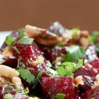 Beet Salad Side · Roasted red, crumbled feta and walnuts with EVO.