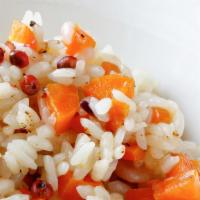 Greek Rice Pilaf · Greek rice pilaf with onions, garlic, carrots, fresh lemon & herbs