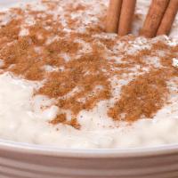 Greek Rice Pudding · Greek rice pudding topped with cinnamon.