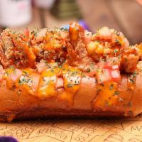The Crown Heights Roll · Seasoned battered Fried Maine Lobster drizzled in our spicy house made jerk sauce. Served wi...