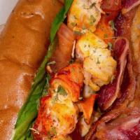 Lobster Blt · Seasoned Maine lobster served with thick cut applewood bacon, fresh lettuce and crisp tomato...