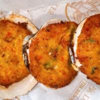 Stuffed Clams (3) · 3 delicious Clams stuffed with lobster and seasoned with our signature spice blend.