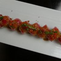 Red Dragon Roll · Shrimp tempura, avocado inside with tuna, sweet ginger sauce.