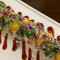 Mardi Gras Roll · Fish tempura inside, topped with seaweed salad, mango, and a sprinkling of purple cabbage. f...