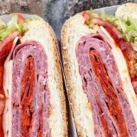 Godfather Sandwich · Ham cappy, genoa salami, pepperoni, provolone, lettuce, tomato, and peppers on a hero. Serve...