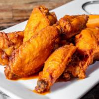 Chicken Wings · Dry rub,  buffalo, or  BBQ with carrot and celery sticks,  chunky blue cheese or ranch.