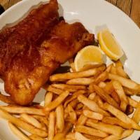 Traditional Fish And Chips · Porterhouse Brew Co. beer-battered cod, lemon tartar sauce, and mushy peas.