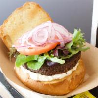 Falafel Burger · Served with lettuce, tomato, and onion as well as your choice of tahini or tzatziki sauce.