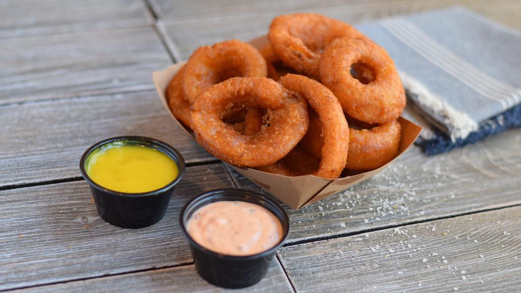 Onion Rings · Beer battered onion rings, includes Spicy Mayo
