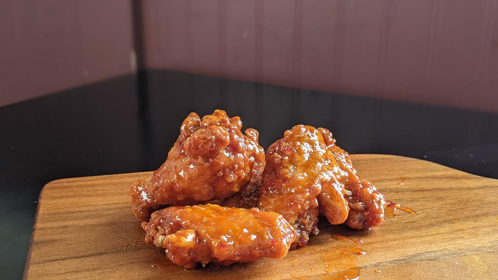 10 Wings · 10 wings tossed in sauce of your choice!