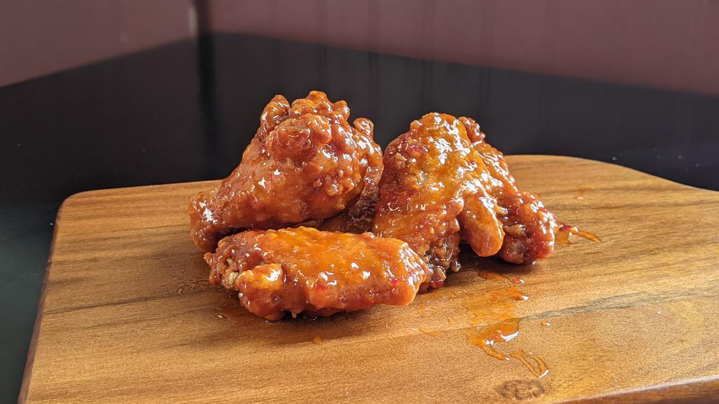 15 Wings · 15 wings tossed in sauce of your choice!