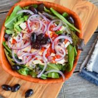 House Salad · served on a spring mix with chopped mozzarella, chopped roasted red peppers, kalamata olives...