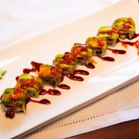 Dragon Roll · Eel cucumber in topped with avocado masago with eel sauce.