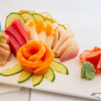 Sashimi Assortment · 15 pcs assorted raw fish.