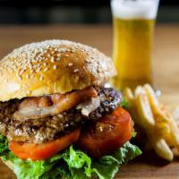 Classic Hamburger · Juicy house made beef hamburger seasoned with house spices chard grilled served on a toasted...