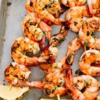 Shrimp Sis Kebab · Skewered jumbo shrimp and seasonal vegetables marinated with yogurt, tomato paste, garlic an...