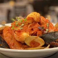 Seafood Fra Diavolo  · Mussels, Clams, Shrimp, Calamari & Scallops in a Spicy Marinara Sauce