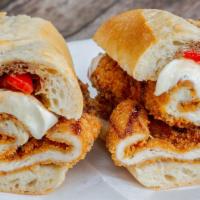 Fried Chicken Cutlet · Fried chicken with fresh mozzarella and roasted peppers and balsamic.