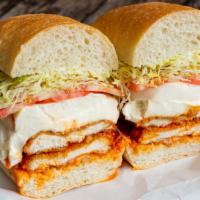 Buffalo Chicken · Fried Buffalo chicken and Fresh Mozzarella with lettuce, tomato and blue cheese dressing.
