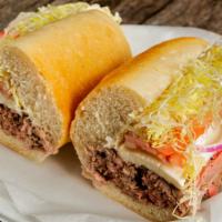 Roast Beef · Fresh roast beef with fresh mozzarella, lettuce, tomato and oil and vinegar.