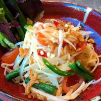 Northeast Green Papaya Salad · Sun dried shrunk shrimp, Peanuts, Fermented fish sauce