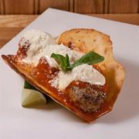 Meatball Parm · three meatballs, tomato sauce, melted cheese, parmigiano, basil