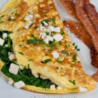 Greek Omelette · Spinach, onion, tomatoes, oregano and feta cheese.