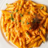 Penne Alla Vodka · Penne tossed in Pink Vodka Sauce with Prosciutto.