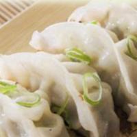 Vegetable Dumplings · Streamed mix veggie dumpling served with sweet soy vinaigrette