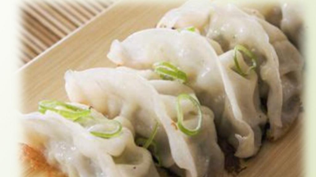 Vegetable Dumplings · Streamed mix veggie dumpling served with sweet soy vinaigrette