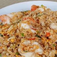 Thai Fried Rice · Cooked Thai style with egg, onion, scallion and carrot