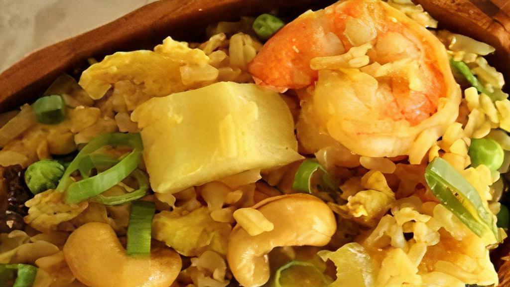 Pineapple Fried Rice · Stir-fried rice with egg, onion, cashew nut, pineapple and carrot