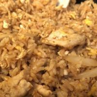 Tom Yum Fried Rice · Stir-fried rice with egg, onion, tom yam sauce, and mushroom