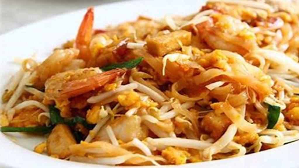 Pad Thai · sautéed rice thin noodle with crushed peanut, bean sprouts, scallion and egg in tamarind sauce