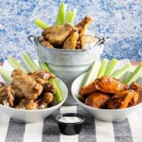 Vbc Jumbo Chicken Wings · Fried Crispy & Tossed in your Favorite Sauce! Served with Celery Sticks & Blue Cheese Dippin...