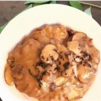 Chicken Marsala · Traditional mushrooms gravy.