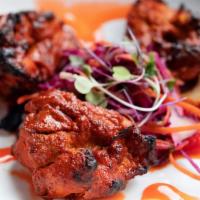 Ghost Chili Chicken Kebab · Spicy. Chef's ghost chili marinade and piquillo marmalade.