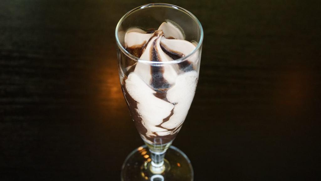 Hazelnut Chocolate Flute · Smooth hazelnut gelato, swirled with rich chocolate sauce.