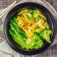 Wonton Noodle Soup · 8 pieces of yellow thick wonton skin with pork fillings and noodles, vegetables, and a dash ...