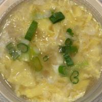 Egg Drop Soup · Beaten egg drizzled over our original soup broth.