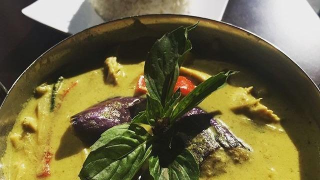 Veggies Green Curry · Thai coconut green curry, bamboo shoot, eggplant, bell pepper, and basil. Mild spicy. Served with thai jasmine rice.